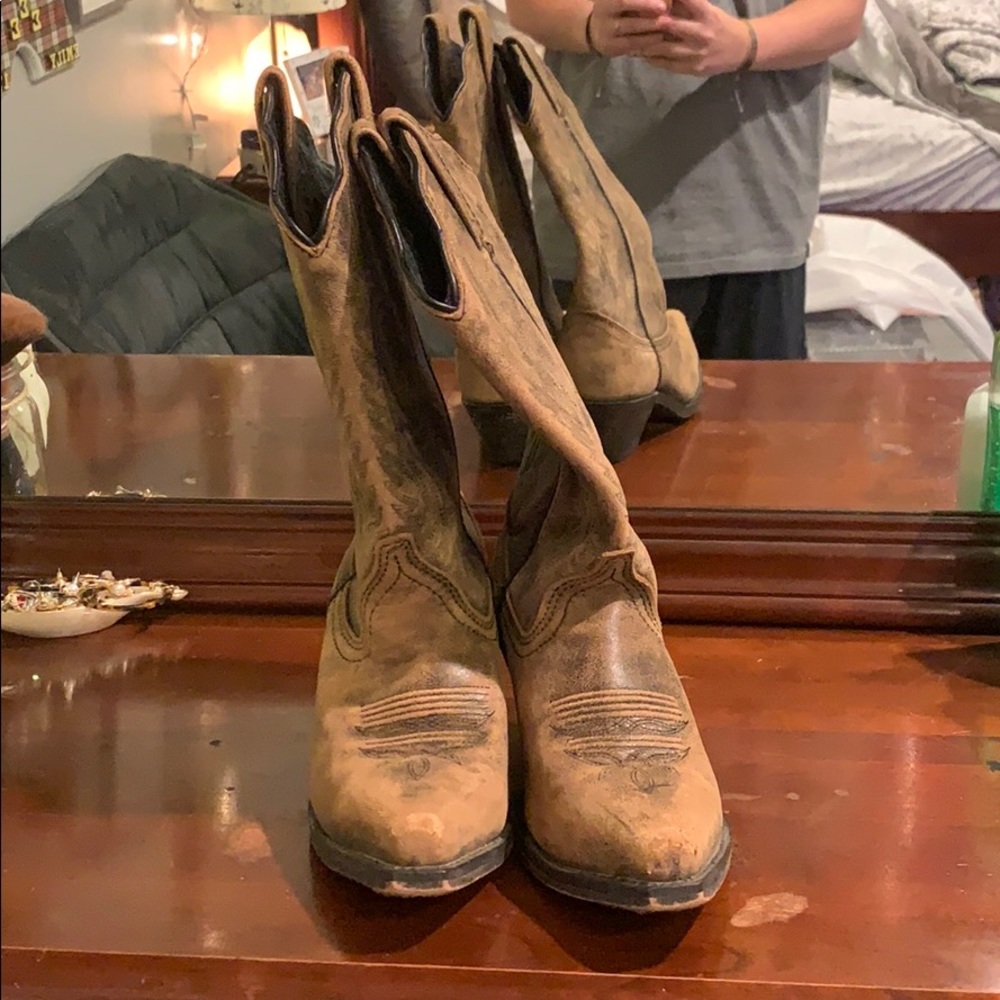 Brown, western style cowgirl boots!
